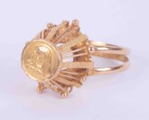 An unusual 18ct yellow gold ring with a religious icon engraved on the top, 3.00gm, size O 1/2.