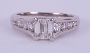 An 18ct white gold ring set centrally with 0.80 carats of an unusual fancy rectangular cut diamond