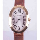 Cartier, a ladies 18ct yellow gold Baignoire flat SM YG oval faced Cartier quartz wristwatch with