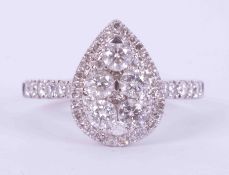 An 18ct white gold pear shaped cluster ring set with a total of 1.00 carats of round brilliant cut