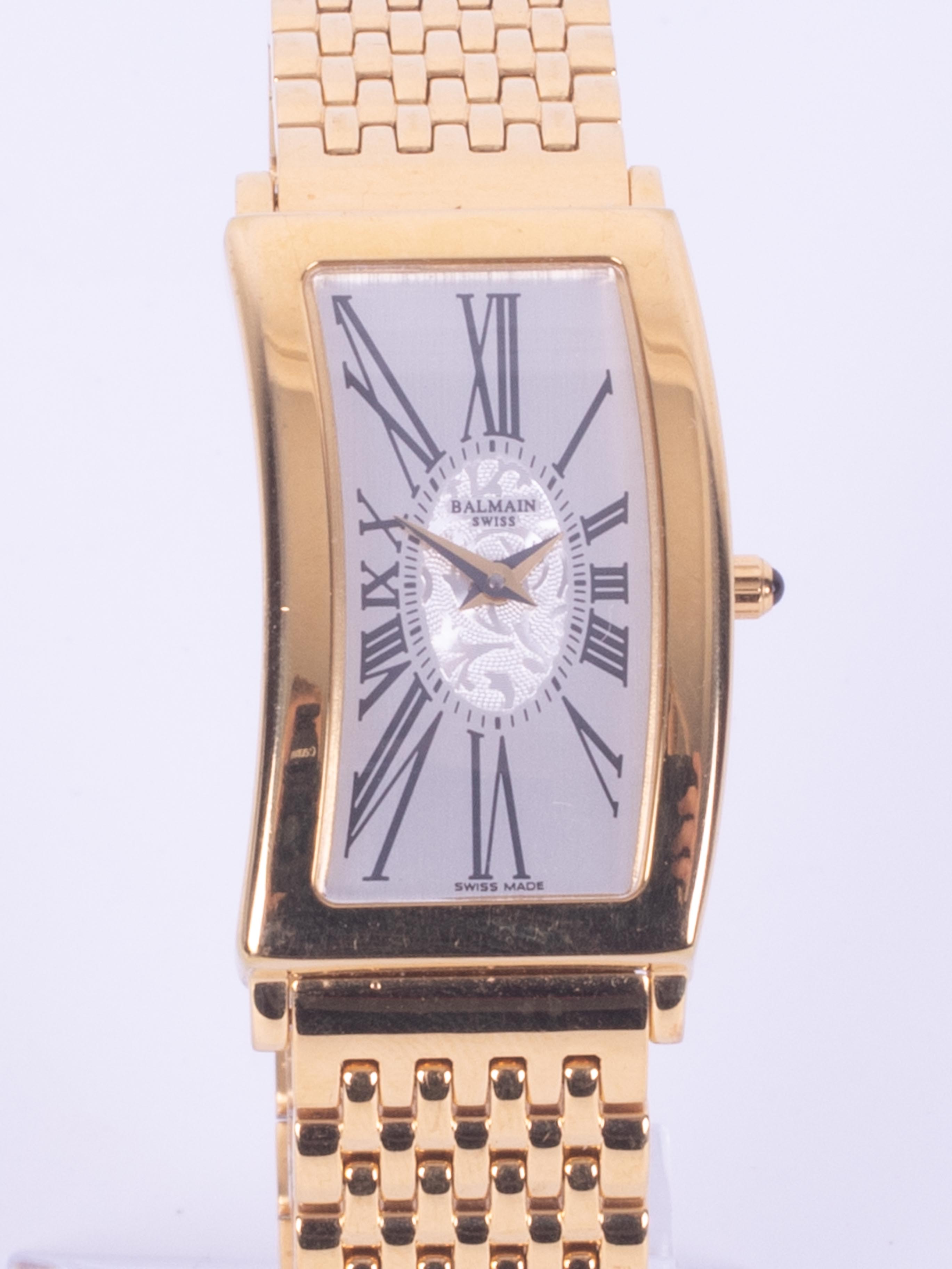 Balmain, a ladies Swiss curved rectangular cased gilt metal bracelet wristwatch with silver baton