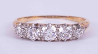 An 18ct yellow gold five stone ring set with old round cut diamonds, approx. total diamond weight