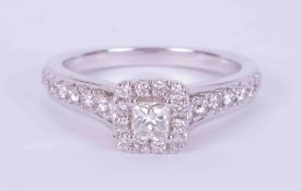 An 18ct white gold halo ring by Vera Wang Love Collection set with a central princess cut diamond