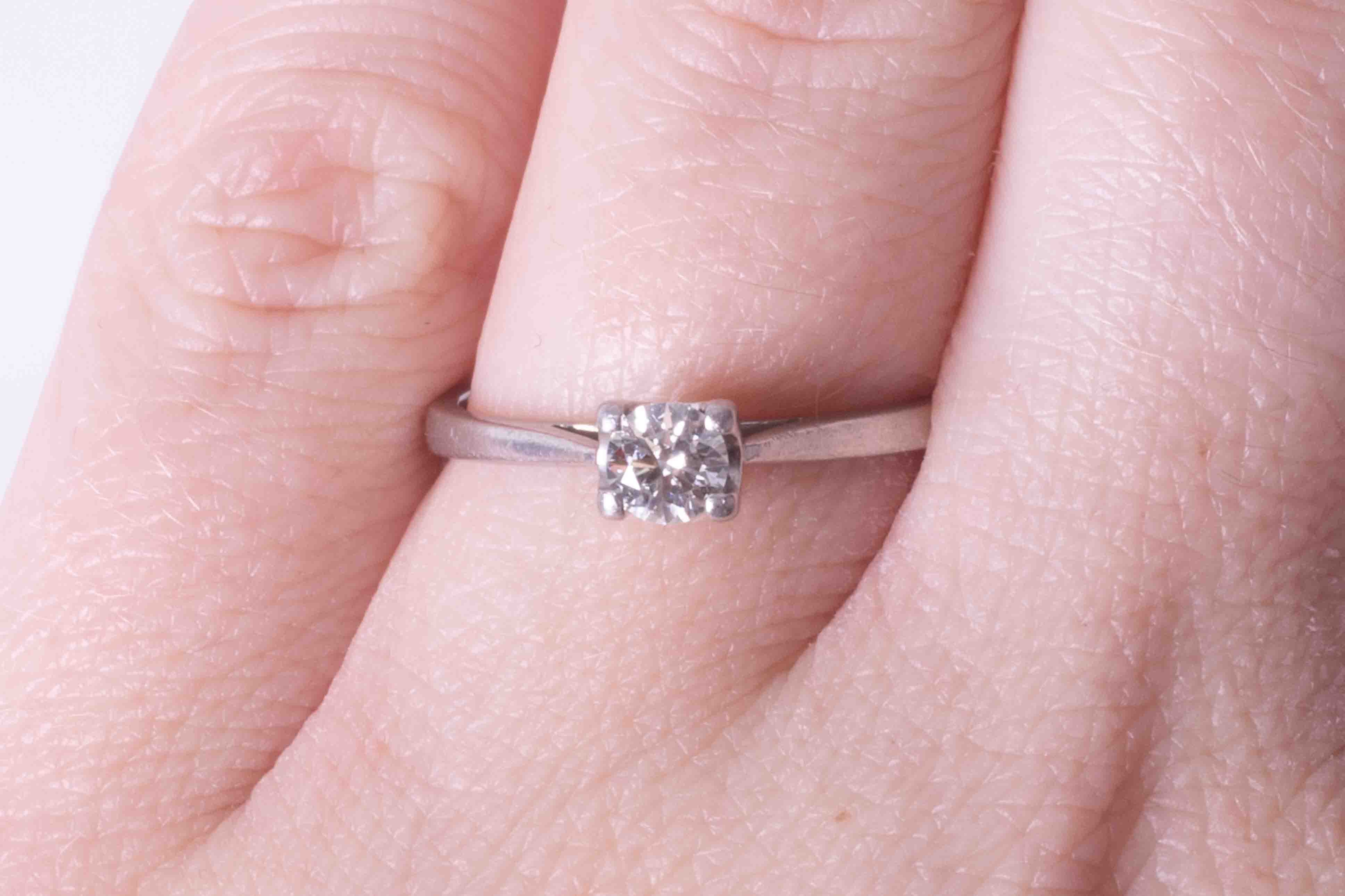 A modern platinum four claw ring set 0.25 carat round brilliant cut diamond, colour G-H, SI clarity, - Image 2 of 2