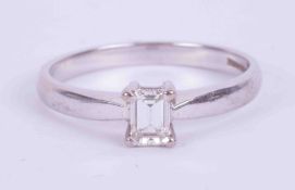 An 18ct white gold ring set with an emerald cut diamond, approx. 0.36 carats, colour G-H and VS2-SI1