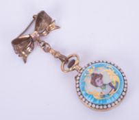 A ladies enamel fob watch with keyless movement, enamelled dial with Arabic numerals and gilt