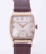 Girard-Perragaux, a gents 10k gold filled square face manual wind wristwatch, with brown leather