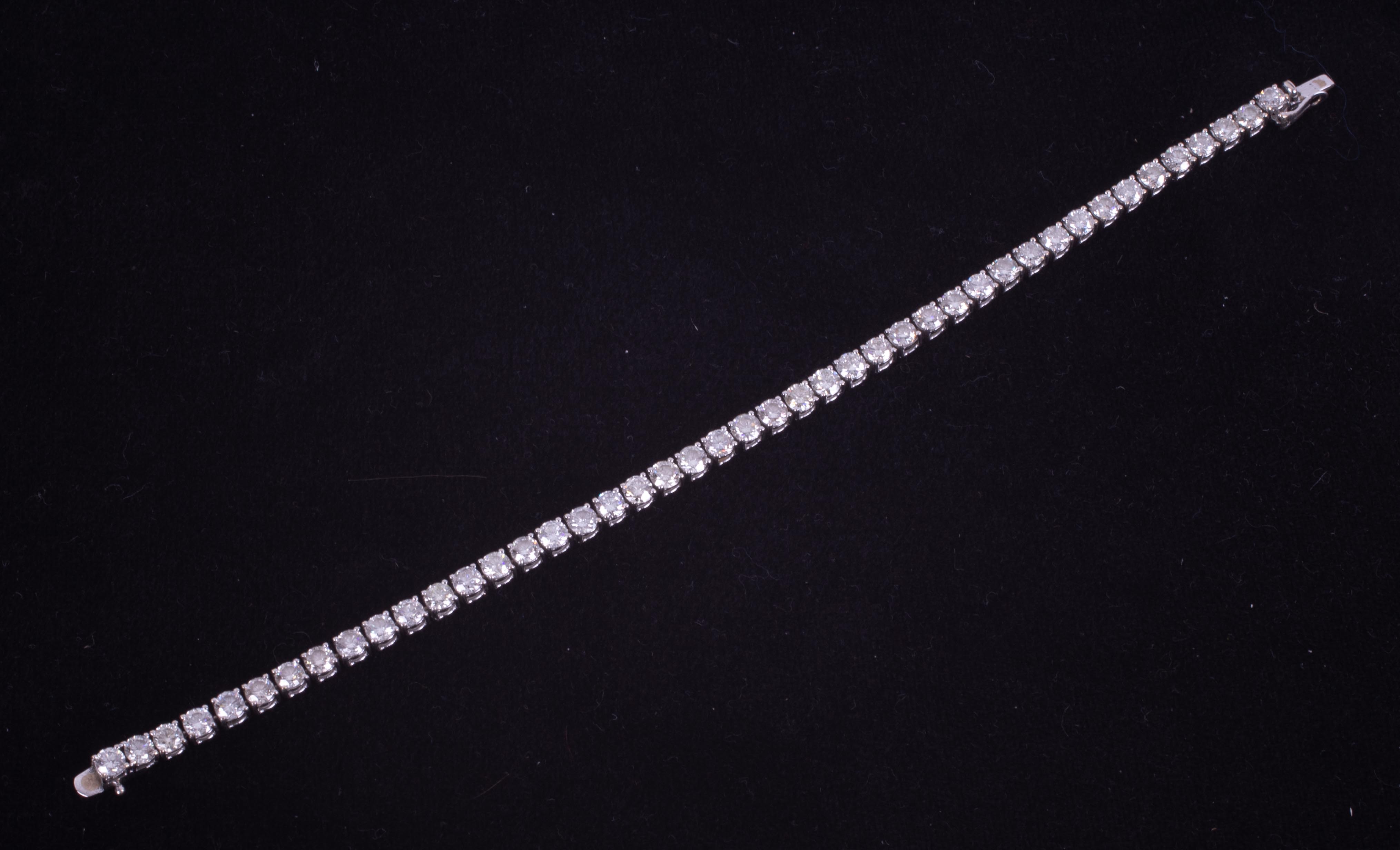 A fine 18ct white gold line bracelet set with 9.00 carats total weight of round brilliant cut - Image 2 of 3