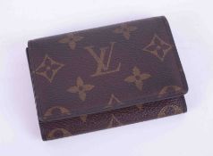 Louis Vuitton, a classic design mini fold over card wallet measuring approx. 4" x 3", stamped inside