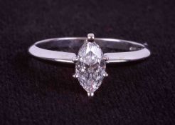 A 14k white gold ring set with a marquise cut diamond, approx. 0.95 carats, colour G-H & SI2