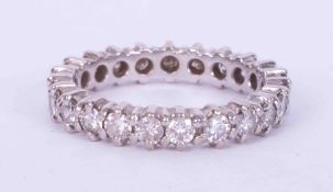 A white gold (no hallmark & not tested) full eternity ring set with approx. 1.38 carats of round