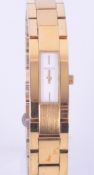 Gucci, ladies quartz gilt metal bracelet fashion watch. Condition reports are offered as a guide