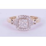 A 9ct yellow gold square cluster style ring set with round brilliant cut diamonds and baguette cut