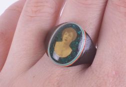 An early 20th Century prisoners? Celluloid ring with a portrait photograph of a lady, 2.37gm,