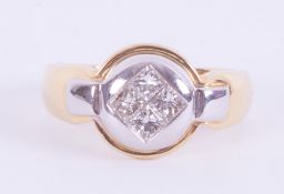 An 18ct yellow & white gold ring set with four princess cut diamonds, total weight approx. 0.72