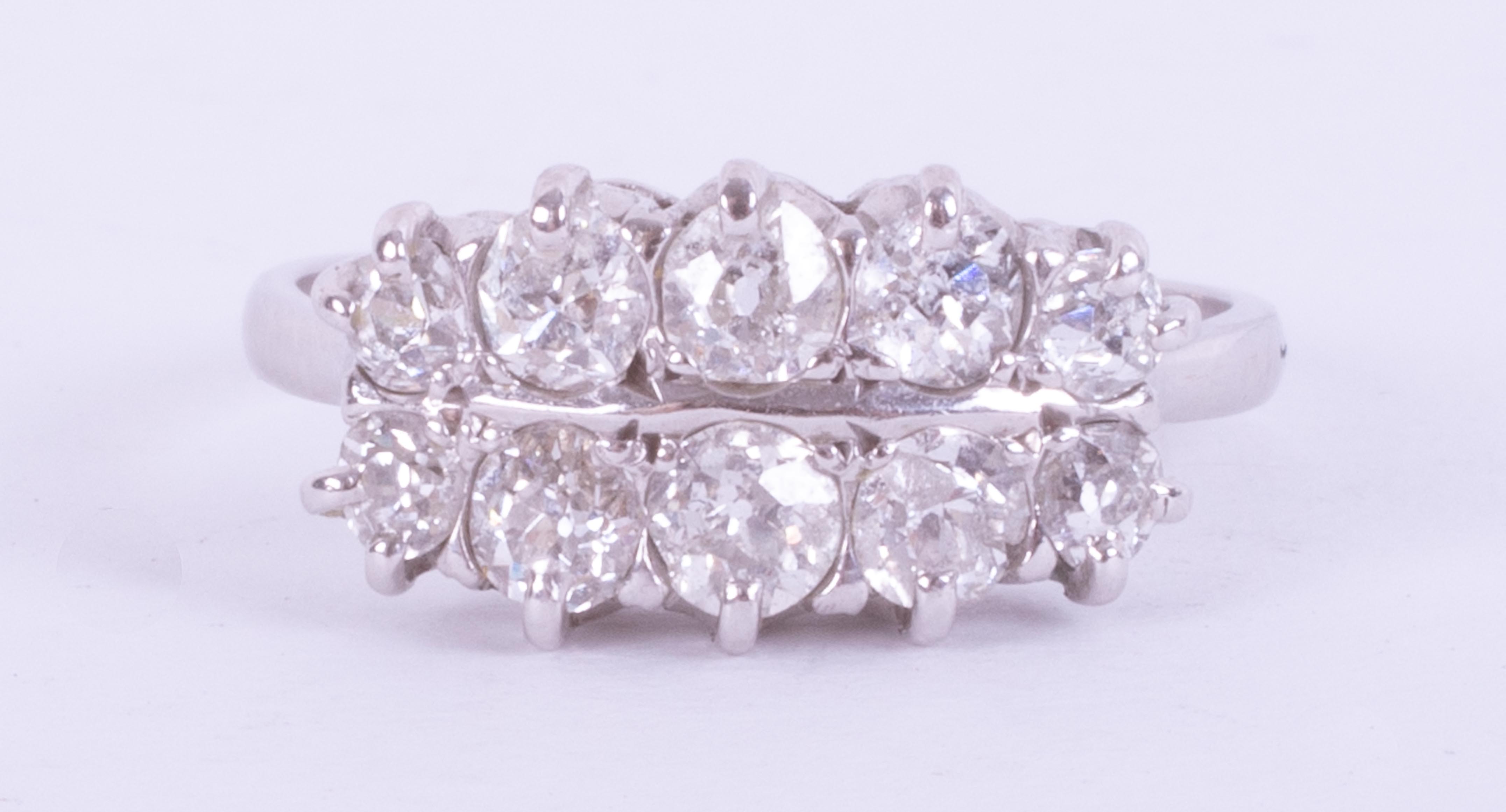 A white gold (not hallmarked or tested) two row ring set with approx. 0.98 carats total weight of