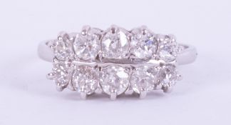 A white gold (not hallmarked or tested) two row ring set with approx. 0.98 carats total weight of