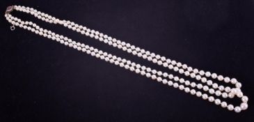 Necklace, a fine double row of knotted cultured pearls, the overall length approx. 21" strung to a