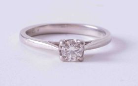 A modern platinum four claw ring set 0.25 carat round brilliant cut diamond, colour G-H, SI clarity,