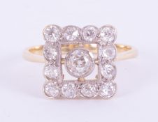 A yellow & white gold (not hallmarked or tested) square design ring set with old round cut diamonds,