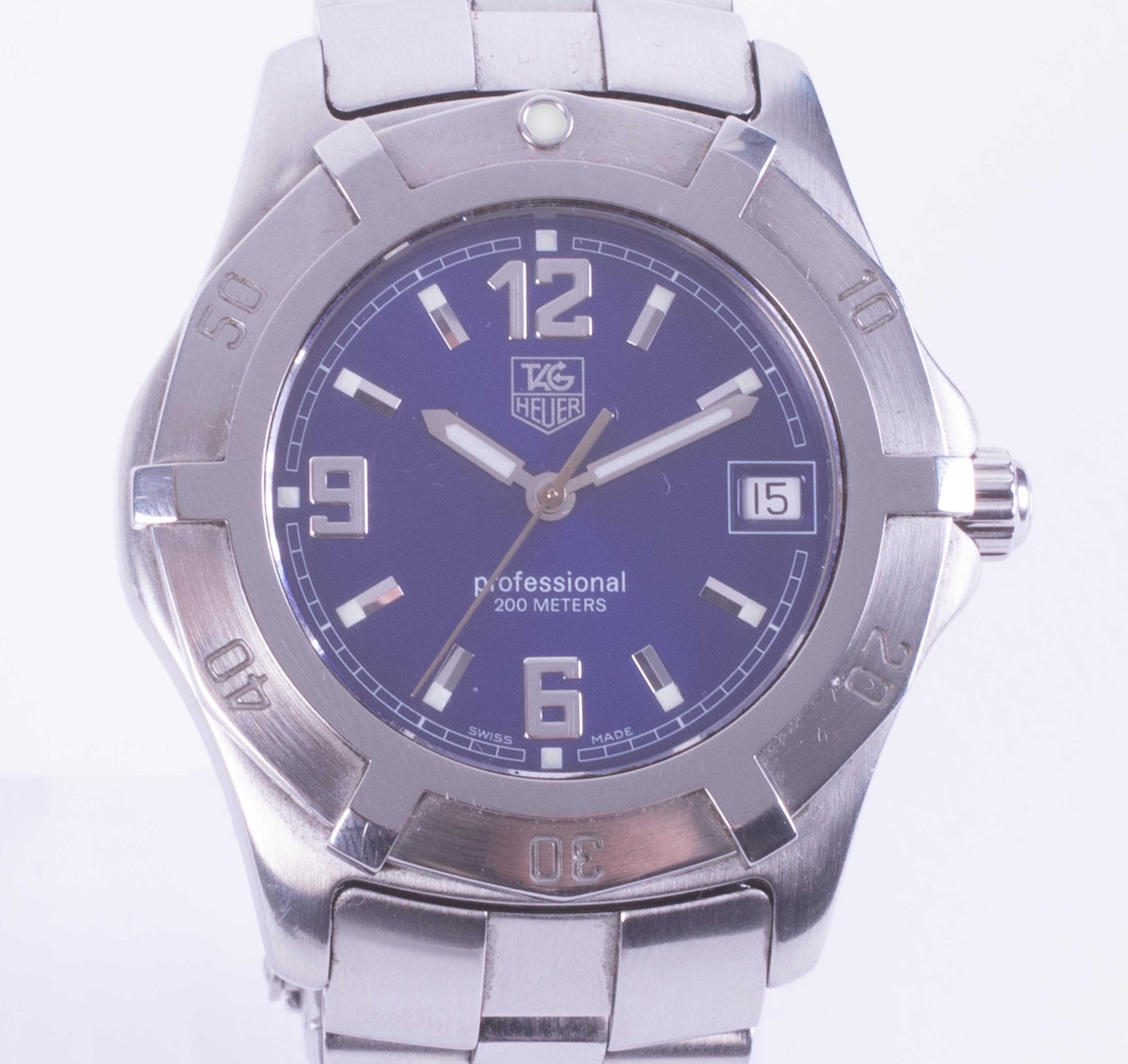 Tag Heuer, a gents stainless steel wristwatch, professional date, box and papers and links, card