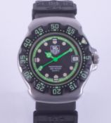 Tag Heuer, a divers watch, the dial marked 'Professional 200 metres, quartz', boxed with outer box.