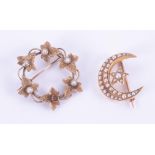 Two brooches to include a 15ct yellow gold circular leaf design brooch set with pearls (one
