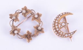 Two brooches to include a 15ct yellow gold circular leaf design brooch set with pearls (one