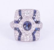 An impressive platinum Art Deco style ring set with sapphires in a mixture of cuts, total weight