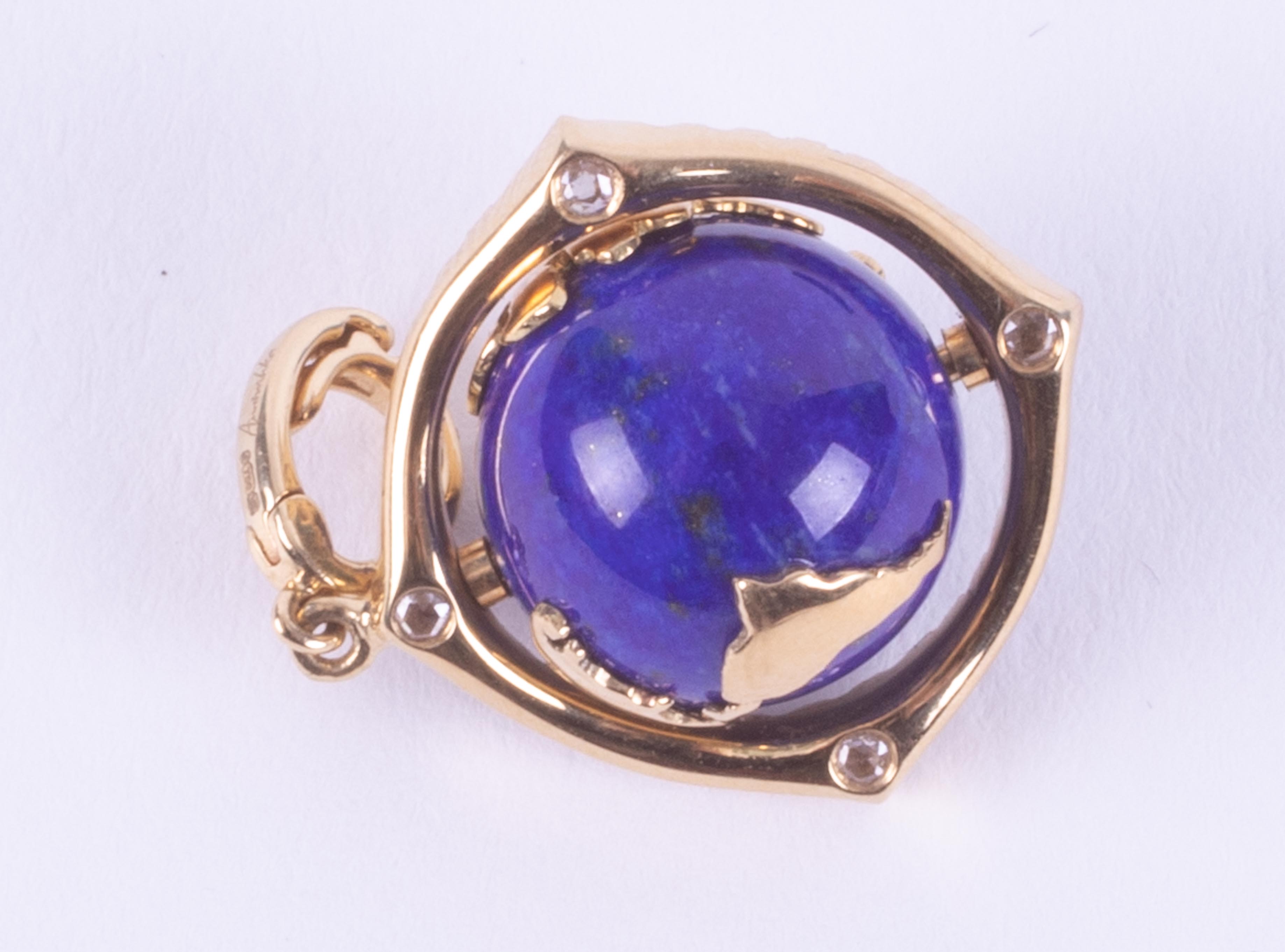 An 18ct yellow gold pendant set with a spinning lapis lazuli & gold 'World' surrounded by small - Image 6 of 7