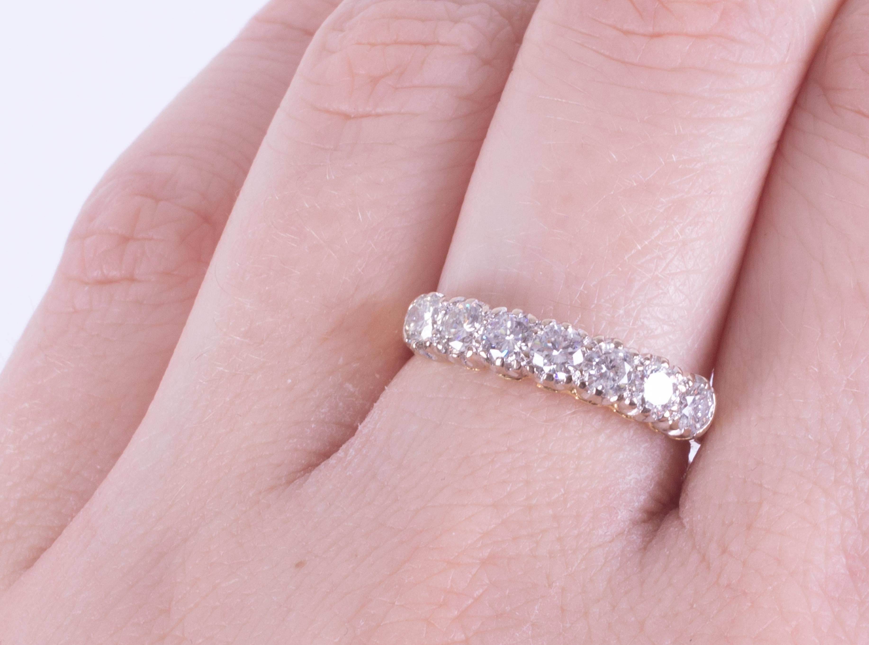 An 18ct yellow & white gold seven stone ring set with round brilliant cut diamonds, total weight - Image 2 of 2