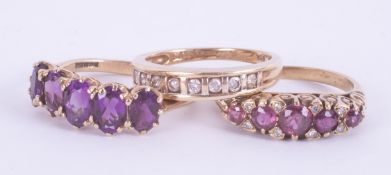 Three 9ct yellow gold rings to include a five stone ruby & diamond ring, 2.88gm, size N 1/2, a