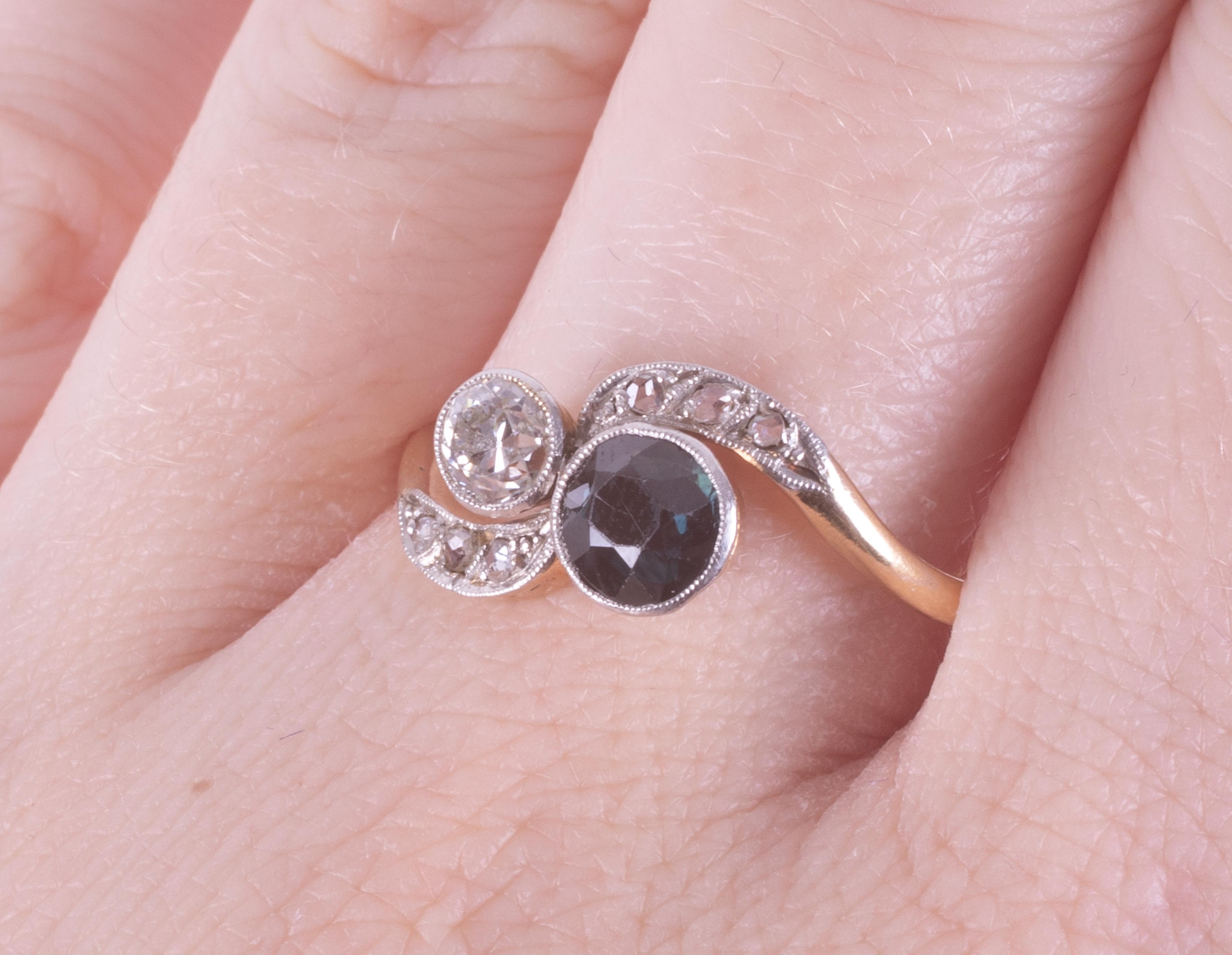 An antique 18ct yellow & white gold twist style ring set with a round cut sapphire and an older - Image 2 of 2