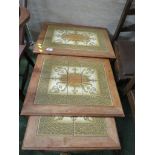 NEST OF THREE MID WOOD OCCASIONAL TABLES WITH TILED TOPS