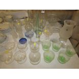 LARGE ASSORTMENT OF GLASS INCLUDING CANDLE HOLDERS, SUNDAE DISHES, CUT BOWLS, JUGS AND ASH TRAY