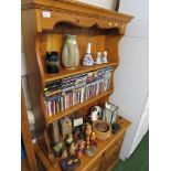 SMALL HONEY PINE DRESSER WITH TWO PLATE SHELVES TO TOP AND TWO DOORS TO BASE.