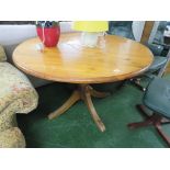 HONEY PINE CIRCULAR KITCHEN TABLE ON QUADRAPED FOOT