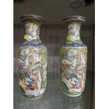 Pair of cylindrical Chinese porcelain vases, famille vert with scenes of warriors in battle,