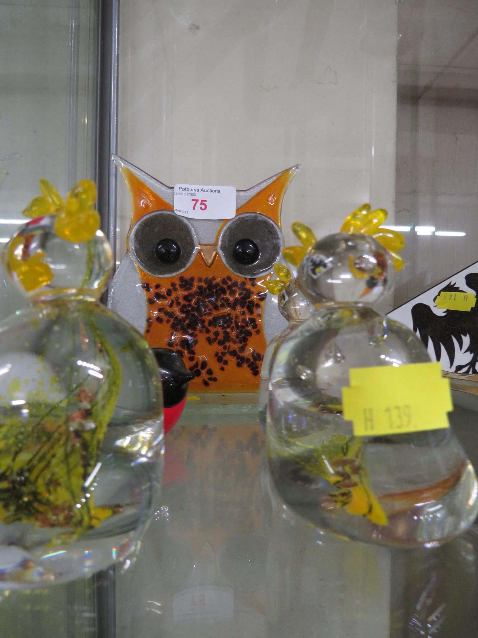 Three Danish glass paper weights of chickens, one bird paper weight and glass owl decoration.