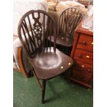 PAIR OF STAINED ELM STICK BACK DINING CHAIRS.