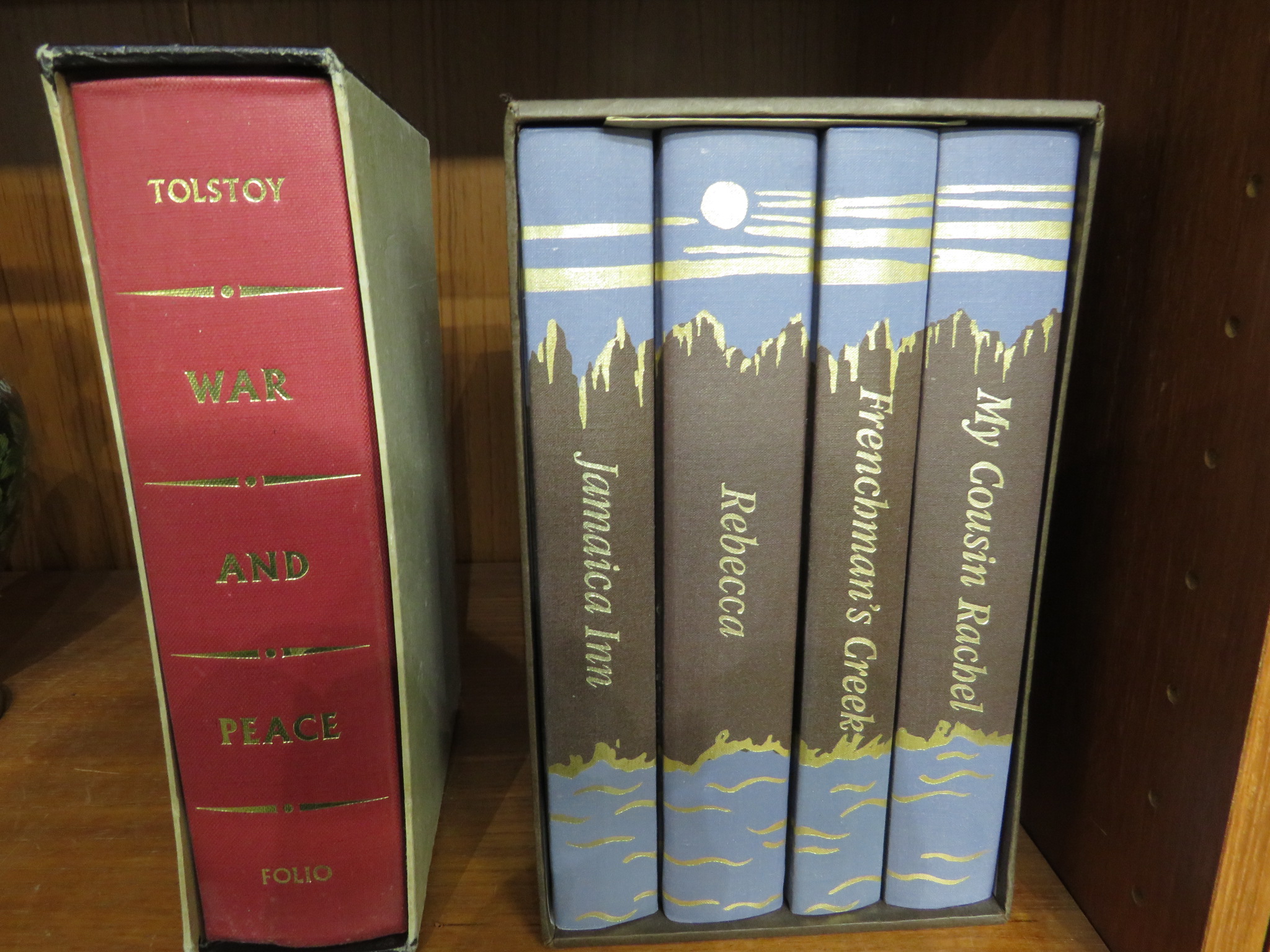 Folio Society set of Daphne Du Maurier novels, and War and Peace, with slip cases