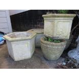 THREE HEXAGONAL YELLOW COMPOSITE STONE PLANTERS MOULDED WITH BIRDS, AND A PAIR OF ROUND COMPOSITE