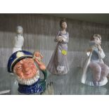 Two Nao porcelain figurines of girls and one other Spanish figurine, together with a Royal Doulton