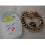 YELLOW METAL CHAIN LINK BRACELET WITH HEART-SHAPE CLASP AND SAFETY CHAIN, STAMPED 9CT, 22.3G, AND