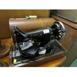 VINTAGE SINGER ELECTRIC SEWING MACHINE WITH OAK CARRY CASE.