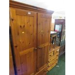 HONEY PINE TWO-DOOR CUPBOARD WITH TWO DRAWERS TO ITS BASE. MEASUREMENTS - 87 CM WIDTH , 185 CM