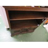 OAK OPEN BOOK CASE WITH ADJUSTABLE SHELF AND TWO CUPBOARD DOORS TO BASE.