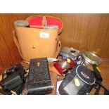 Pair of Zodiac 10x50 binoculars with case, Canon compact film camera and two digital cameras.