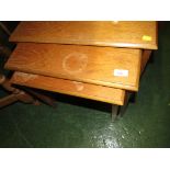 REMPLOY NEST OF THREE TEAK OCCASIONAL TABLES.