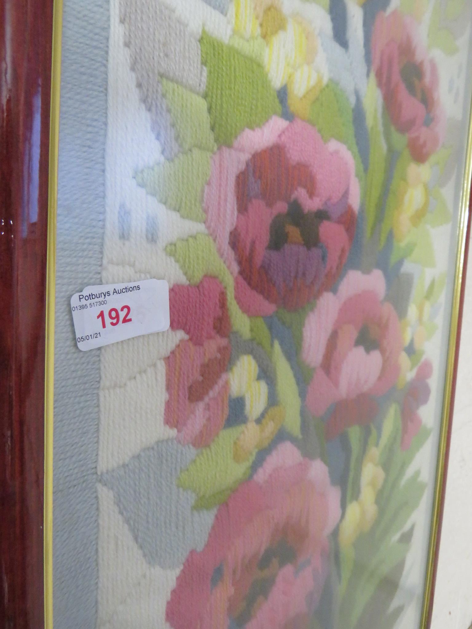 Framed and glazed tapestry of flowers